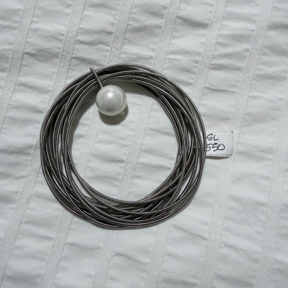 Elegant Silver Coil Bracelet with Pearl Accent